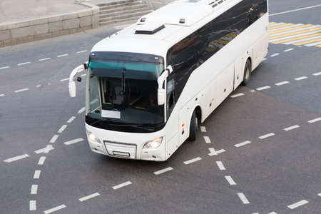 tourist bus at the city intersection