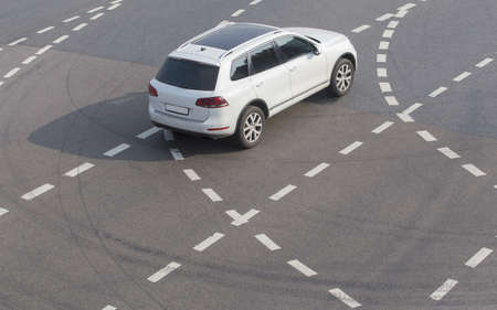 modern car driving on city streetの写真素材