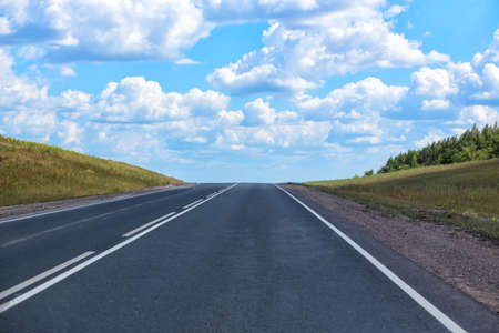 asphalted road sent to distance to horizonの写真素材