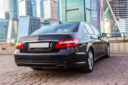 Luxury car parked near the business center Moscow-Cityの写真素材