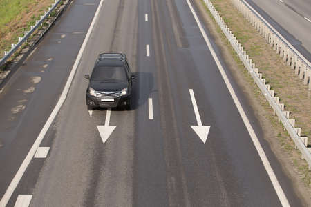 car modern black on the multiband highwayの写真素材