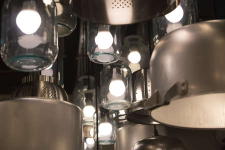 Design chandeliers from pans, glass jars and stewpansの写真素材