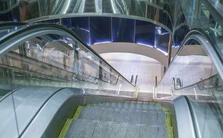 escalator of modern building with moving stepsの写真素材