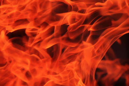 Hot red flame on black backgroundの写真素材