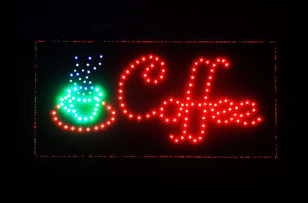 word luminous coffee signboard on black backgroundの写真素材