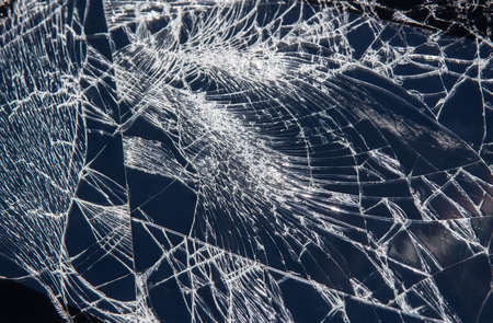 broken screen in tablet cracks close upの写真素材