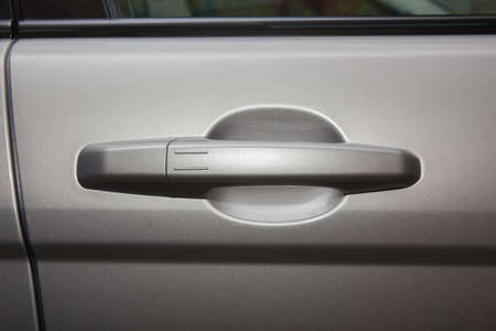 modern car door handle close-upの写真素材