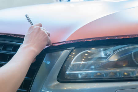 pasting of car carbonic plastic closeupの写真素材