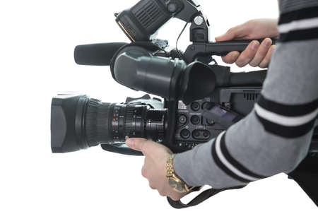Professional camera in hand isolated on whiteの写真素材