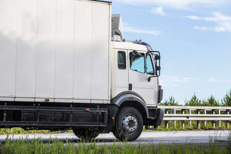 Big powerful truck moves on highwayの写真素材