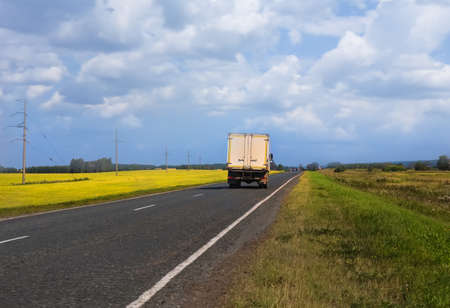 truck transports freight on  country highwayの写真素材