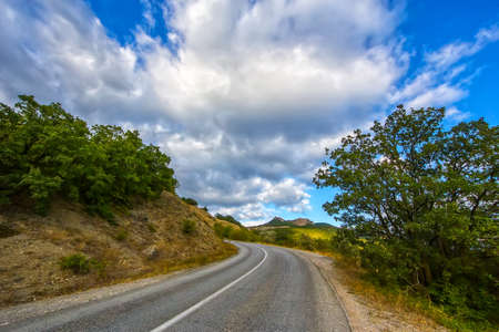 Beautiful Mountain Landscape with Winding Roadの写真素材