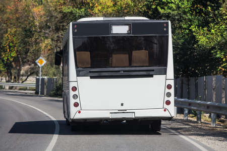 Bus goes on the country highwayの写真素材