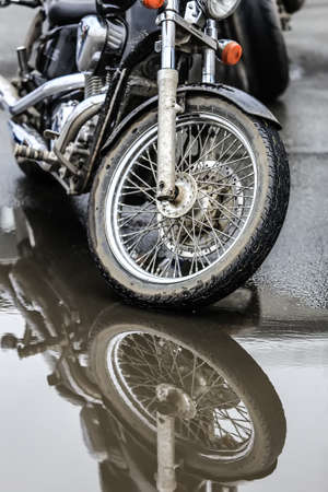 Motorcycles on parking on asphalt close upの写真素材