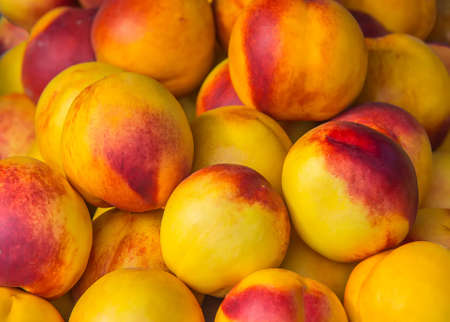 large ripe peaches close-upの写真素材