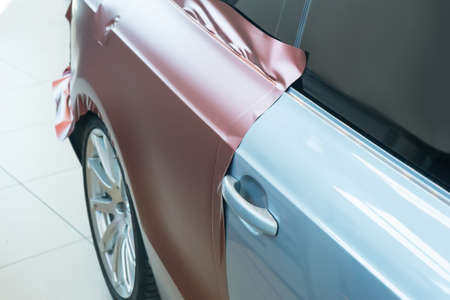 pasting of car carbonic plastic closeupの写真素材