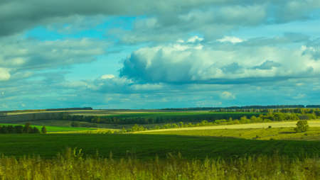 beautiful cloudy sky on the field in summer