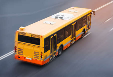 city bus goes along street