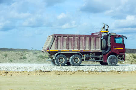 Large dumper on a motorway under constructionの写真素材
