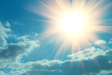 Beautiful Dark Sky with Sun and Cloudsの写真素材