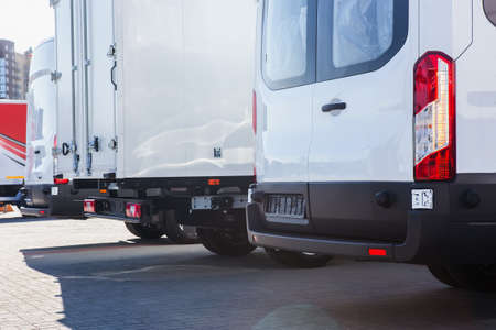 trucks and buses in the parking rear view