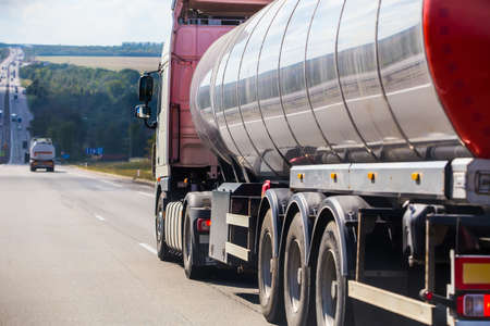Big gas-tank truck goes on highwayの写真素材