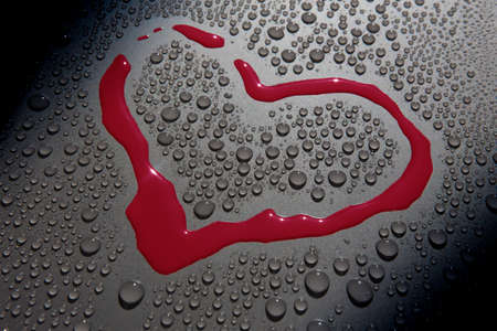 heart symbol blood drop water backgroundの写真素材