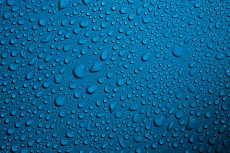 water drops on blue background close-up backgroundの写真素材