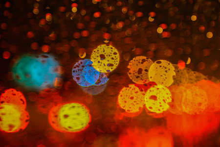 color round bright light spots on  abstract background