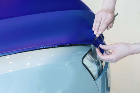 pasting of car carbonic plastic closeupの写真素材