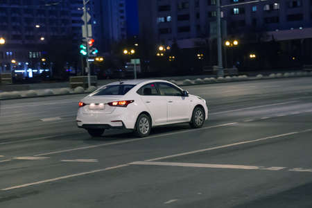 Modern car go on the night cityの写真素材