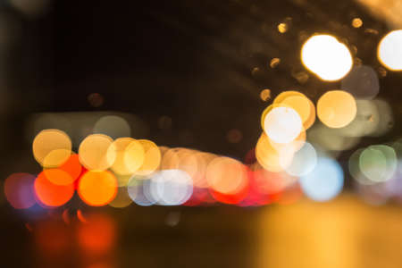 Color round bright light spots on blurred abstract backgroundの写真素材