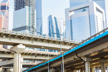 Beautiful view of futuristic city landscape with viaduct, roads and skyscrapers.の写真素材