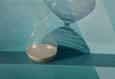 Hourglass as time passing concept for running out of time. Sandglass, egg timer .の写真素材