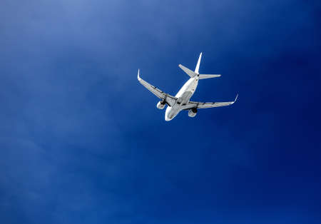 passenger plane in the blue sky