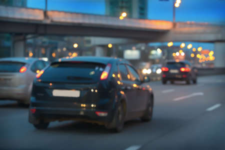 car traffic blurred at night in the city