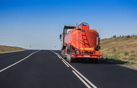Big gas-tank truck goes on highwayの写真素材