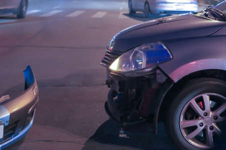 car accident at the intersection in the eveningの写真素材
