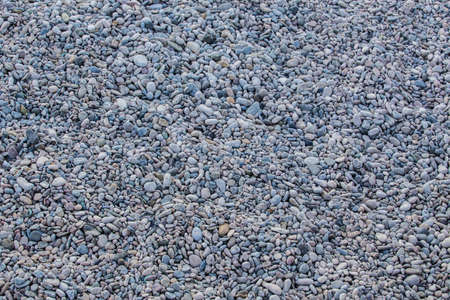 oval smooth pebble on the sea coastの写真素材