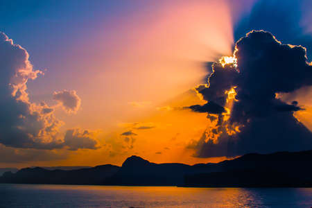 Beautiful Cape on the sea at sunsetの写真素材