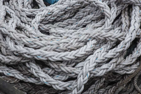 Thick sea ropes on the pier.の写真素材