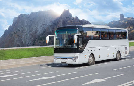 Tourist Bus Rides on the Picturesque mountain highwayの写真素材