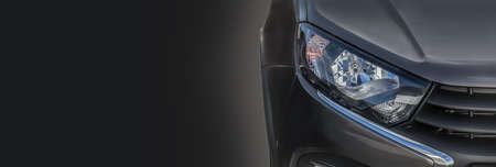 Headlight of a modern new car close-upの写真素材