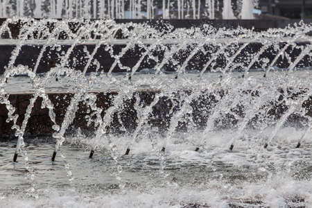 Water jets from the fountain. Detail close-upの写真素材