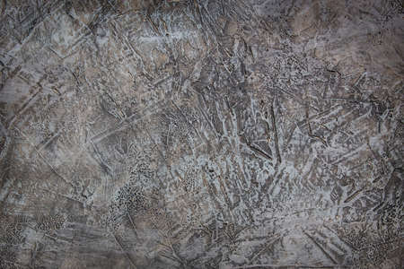 Old grungy tinted stucco on the wall. Background