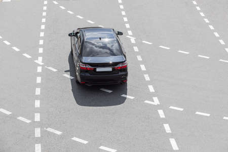 Car on the multiband highway. View from above