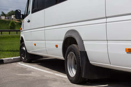 Minibus in the parking lot on a summer day close-upの写真素材