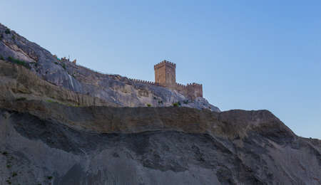 Ancient stone fortress on top of the mountainの写真素材