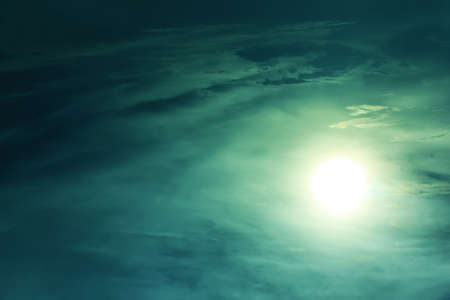 Big Sun Dark blue cloudy sky. Backgroundの写真素材