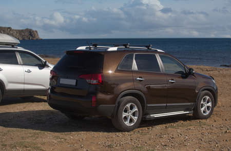 SUVs On the Seashore on a Bright Sunny Dayの写真素材